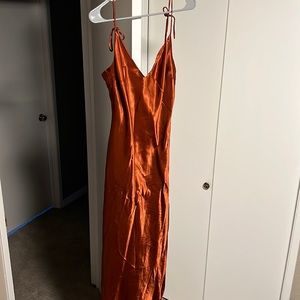 Park and Fifth Met Dress in rust satin